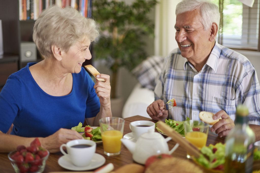 seniors eating independently, mealtime aids